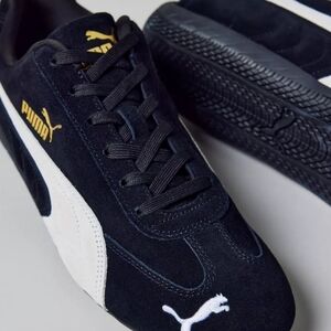 Puma Black and White Sneakers
